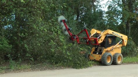 skid steer cutting trees|skid steer limb trimmer attachment.